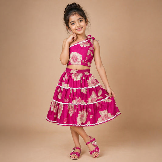 The Magic Wand Cambric Cotton Woven One Shoulder Floral Printed Laced Top And Tiered Skirt Set - Fuchsia