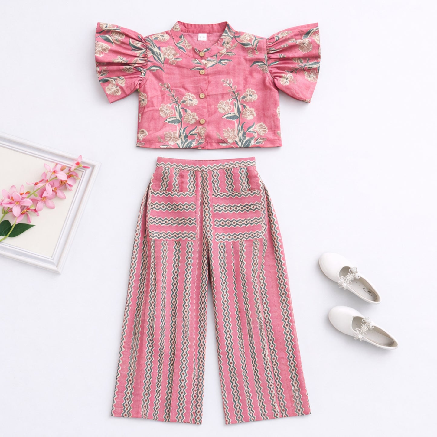 The Magic Wand Cambric Cotton Woven Ruffle Sleeves Floral Printed Shirt And Pant Set - Coral