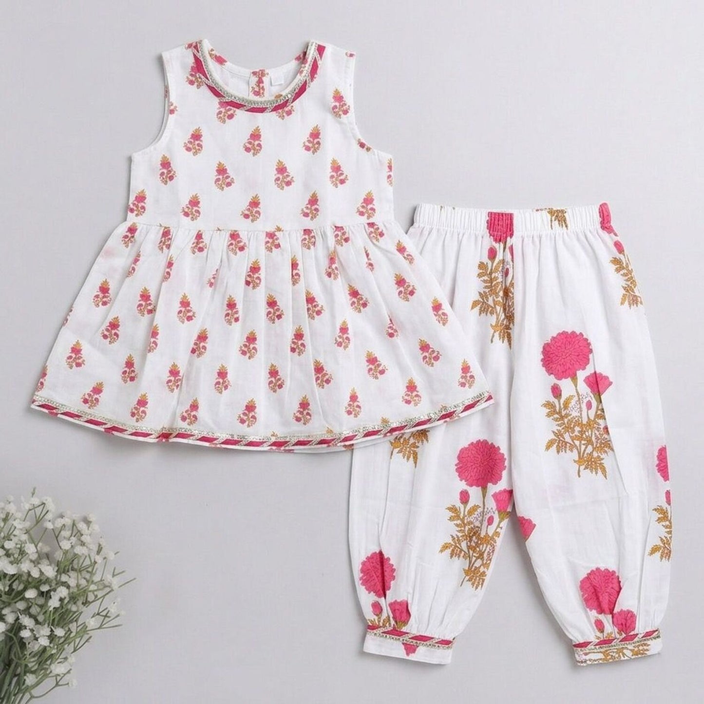 The Magic Wand Cambric Cotton Woven Sleeveless Floral Printed Kurta And Afghani Pant Set - Fuchsia