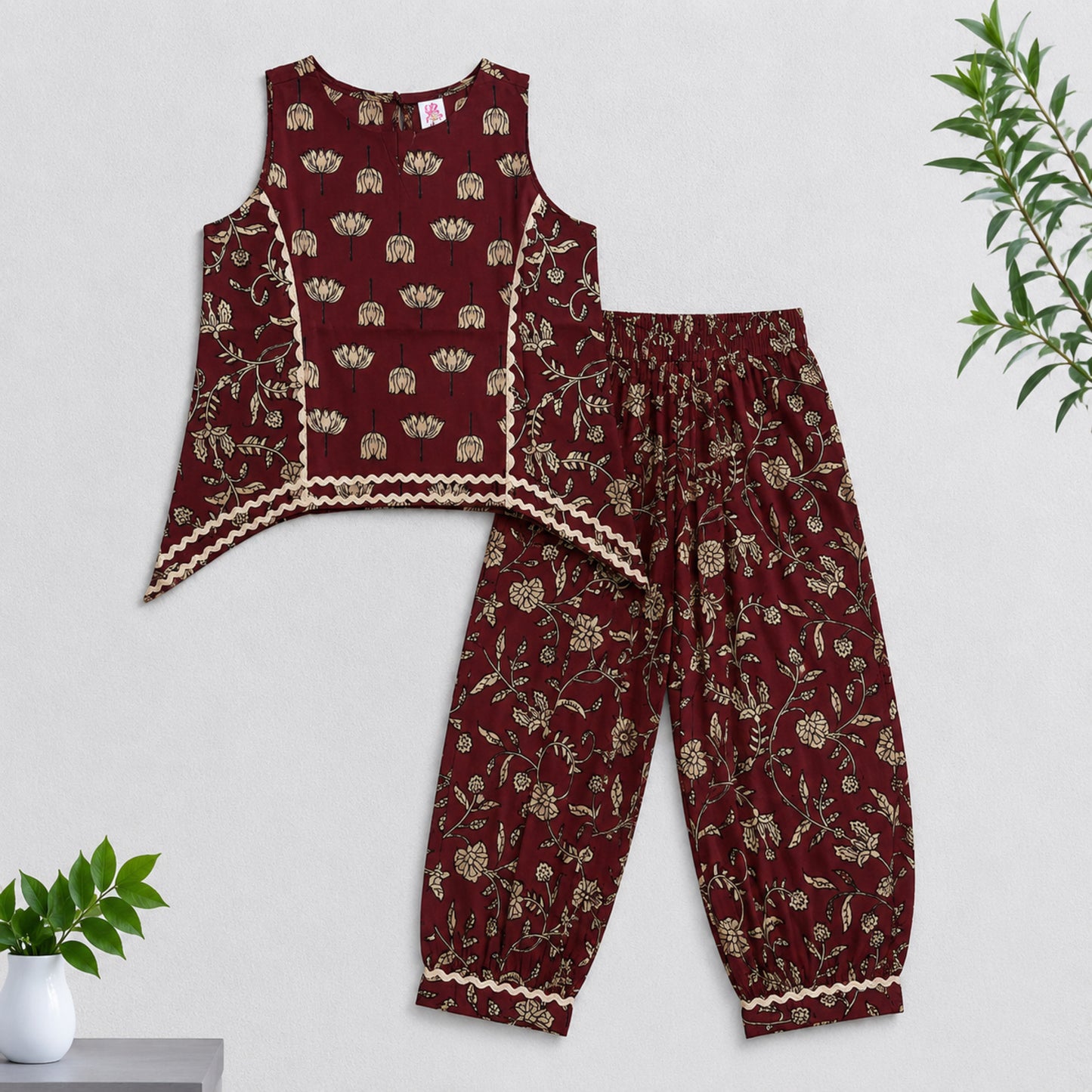 The Magic Wand Cambric Cotton Woven Sleeveless Floral Printed Laced Kurti And Afghani Pant Set -Maroon