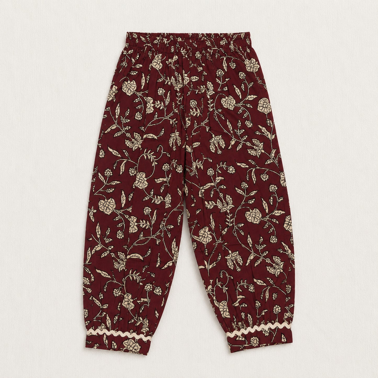 The Magic Wand Cambric Cotton Woven Sleeveless Floral Printed Laced Kurti And Afghani Pant Set -Maroon