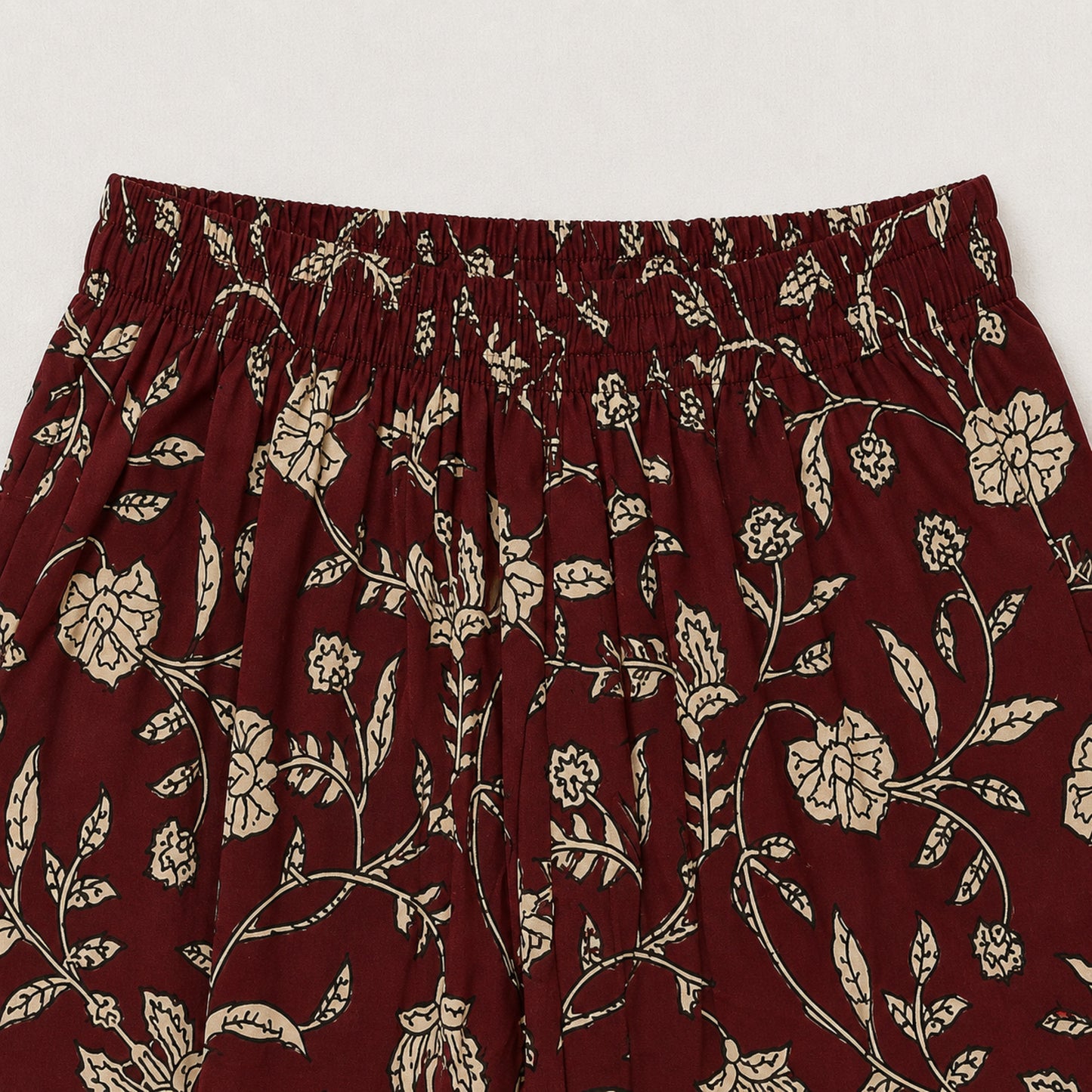 The Magic Wand Cambric Cotton Woven Sleeveless Floral Printed Laced Kurti And Afghani Pant Set -Maroon