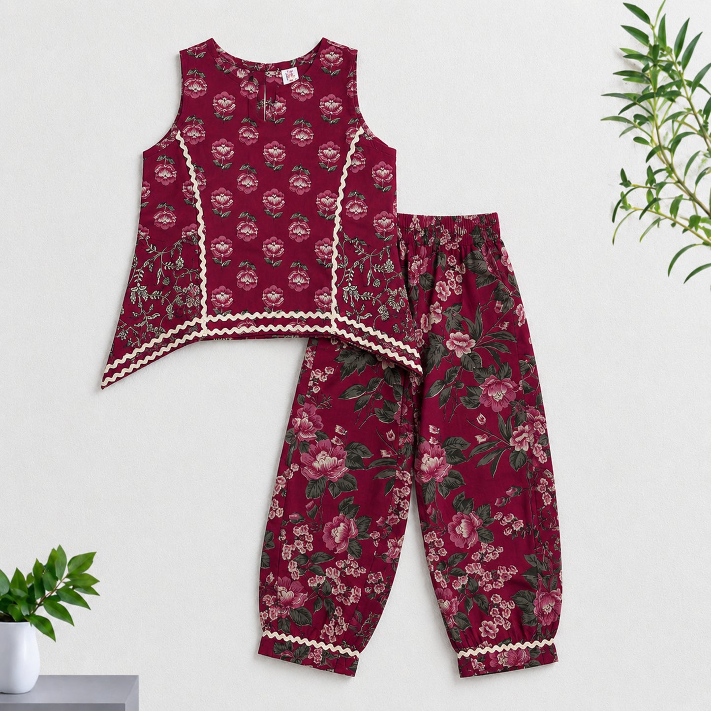The Magic Wand Cambric Cotton Woven Sleeveless Floral Printed Laced Kurti And Afghani Pant Set - Magenta