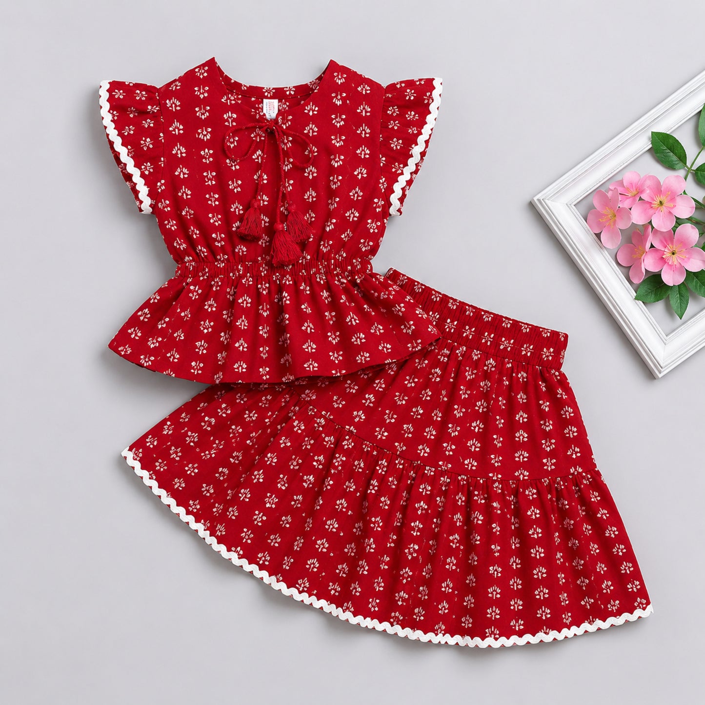 The Magic Wand Cotton Woven Ruffle Sleeves Floral Printed Laced Peplum Top And Skirt Set - Red