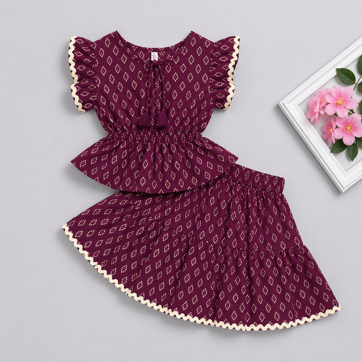 The Magic Wand Cotton Woven Ruffle Sleeves Buti Printed Laced Peplum Top And Skirt Set - Wine
