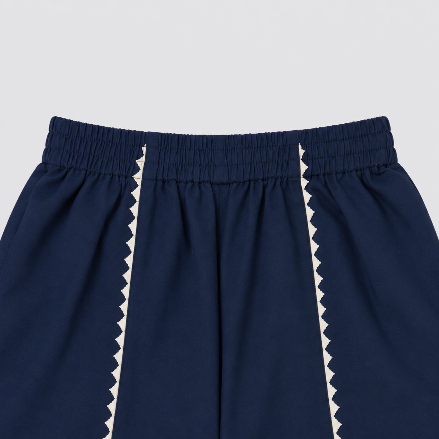 The Magic Wand Cambric Woven Bell Sleeves Bandhani Gathered Kurta And Tulip Pants Set - Navy Blue