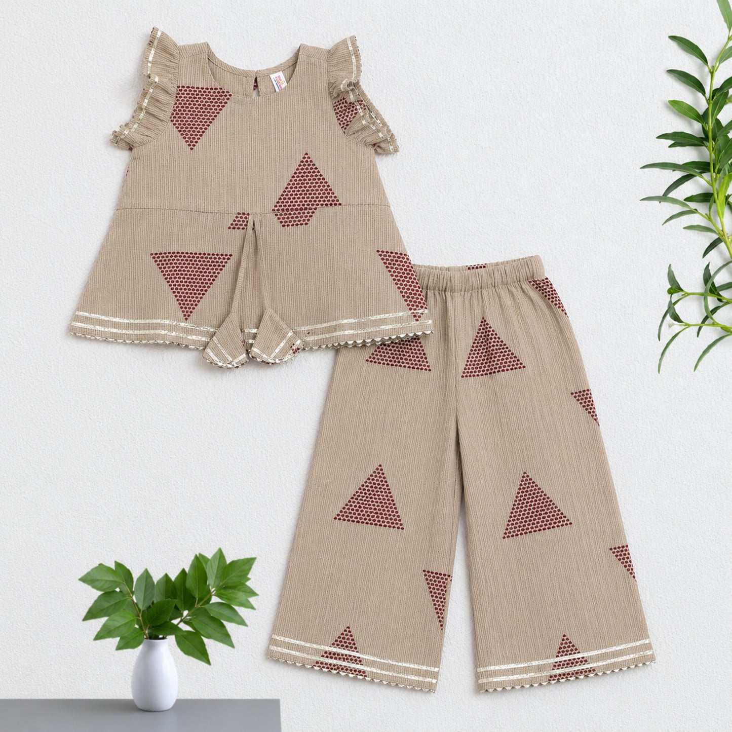 The Magic Wand Cambric Woven Frill Sleeves Geometric Printed Top And Pant Set - Maroon