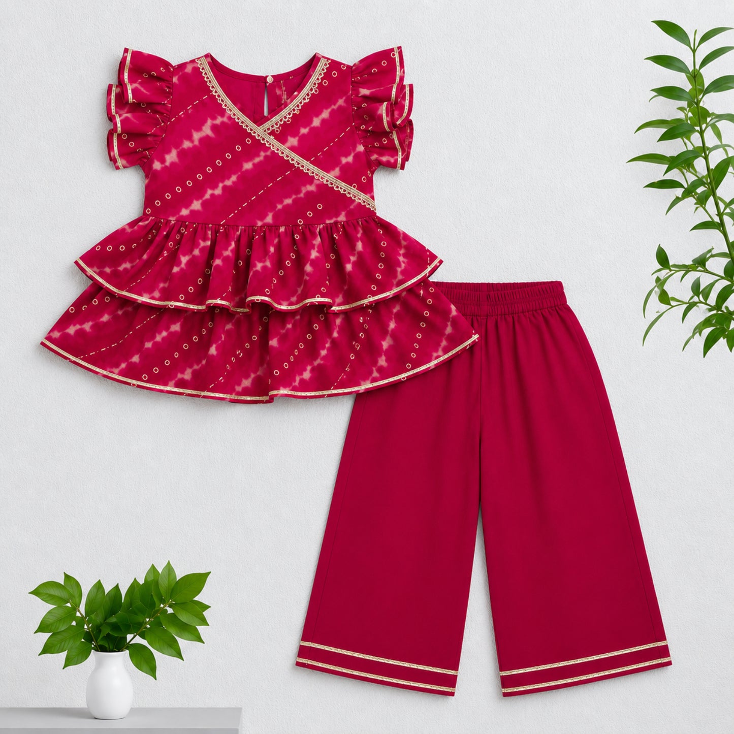 The Magic Wand Cambric Woven Ruffle Sleeves Leheriya Printed Layered Peplum Top And Pant Set - Fuchsia