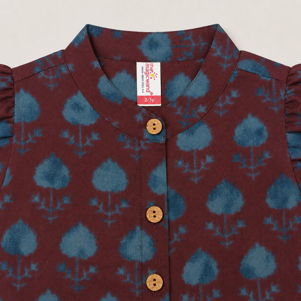 The Magic Wand Cambric Woven Ruffle Sleeves Tree Printed Crop Shirt And Oversized Polka Dots Pant Set - Wine