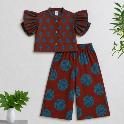 The Magic Wand Cambric Woven Ruffle Sleeves Tree Printed Crop Shirt And Oversized Polka Dots Pant Set - Rust