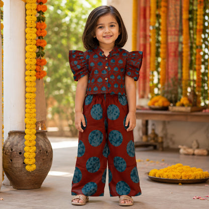 The Magic Wand Cambric Woven Ruffle Sleeves Tree Printed Crop Shirt And Oversized Polka Dots Pant Set - Rust