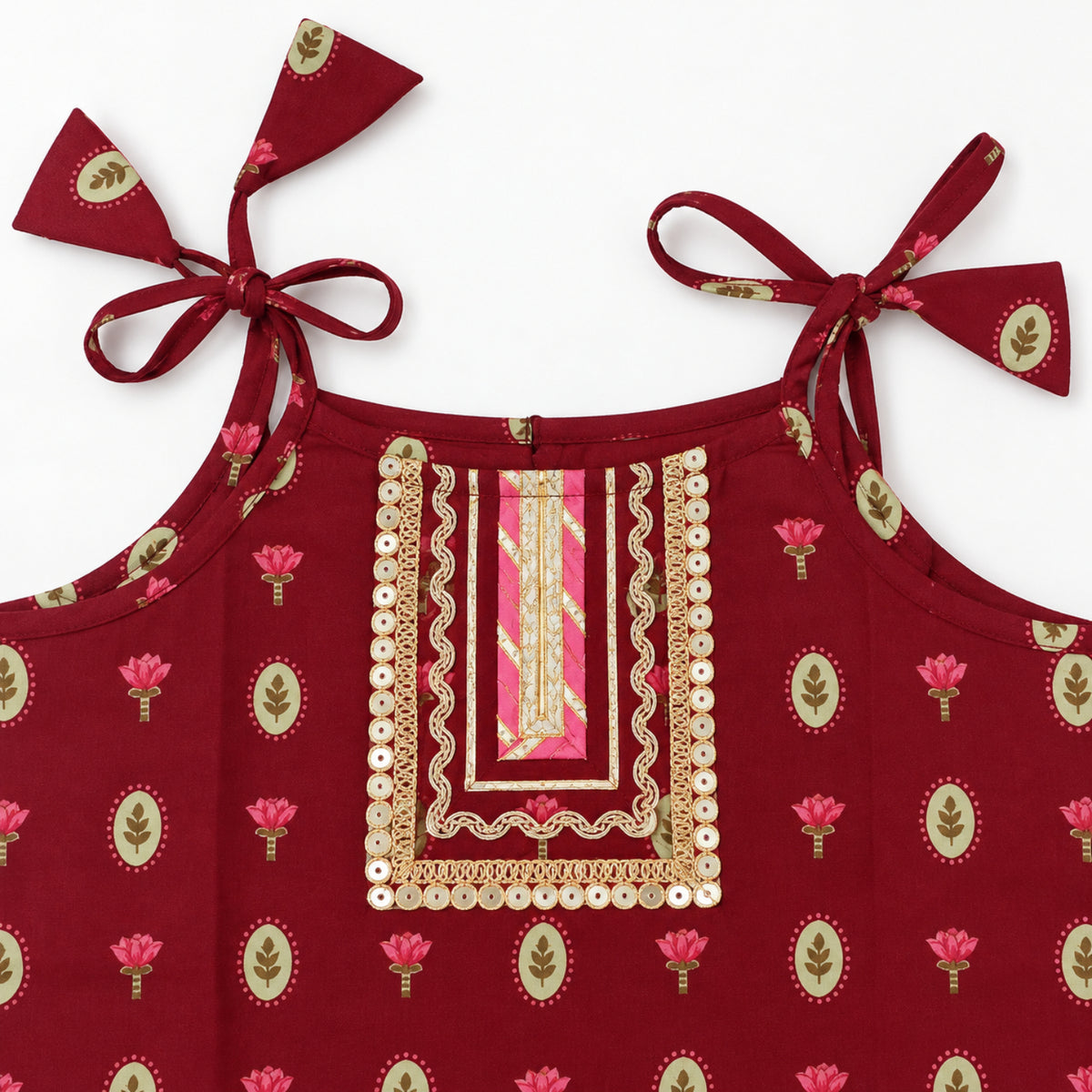 The Magic Wand Cotton Woven Cambric Floral Printed Laced And Tassel Detail Shoulder Tie-Up Kurti And Rayon Skirt Set - Maroon