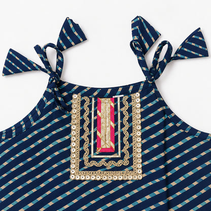 The Magic Wand Cotton Woven Cambric Leheriya Printed Laced And Tassel Detail Shoulder Tie-Up Kurti And Rayon Skirt Set - Navy Blue