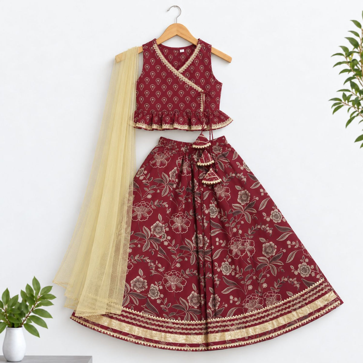 The Magic Wand Cotton Woven Cambric Sleeveless Floral Printed Tassel Detail Choli And Lehenga Set With Dupatta - Maroon