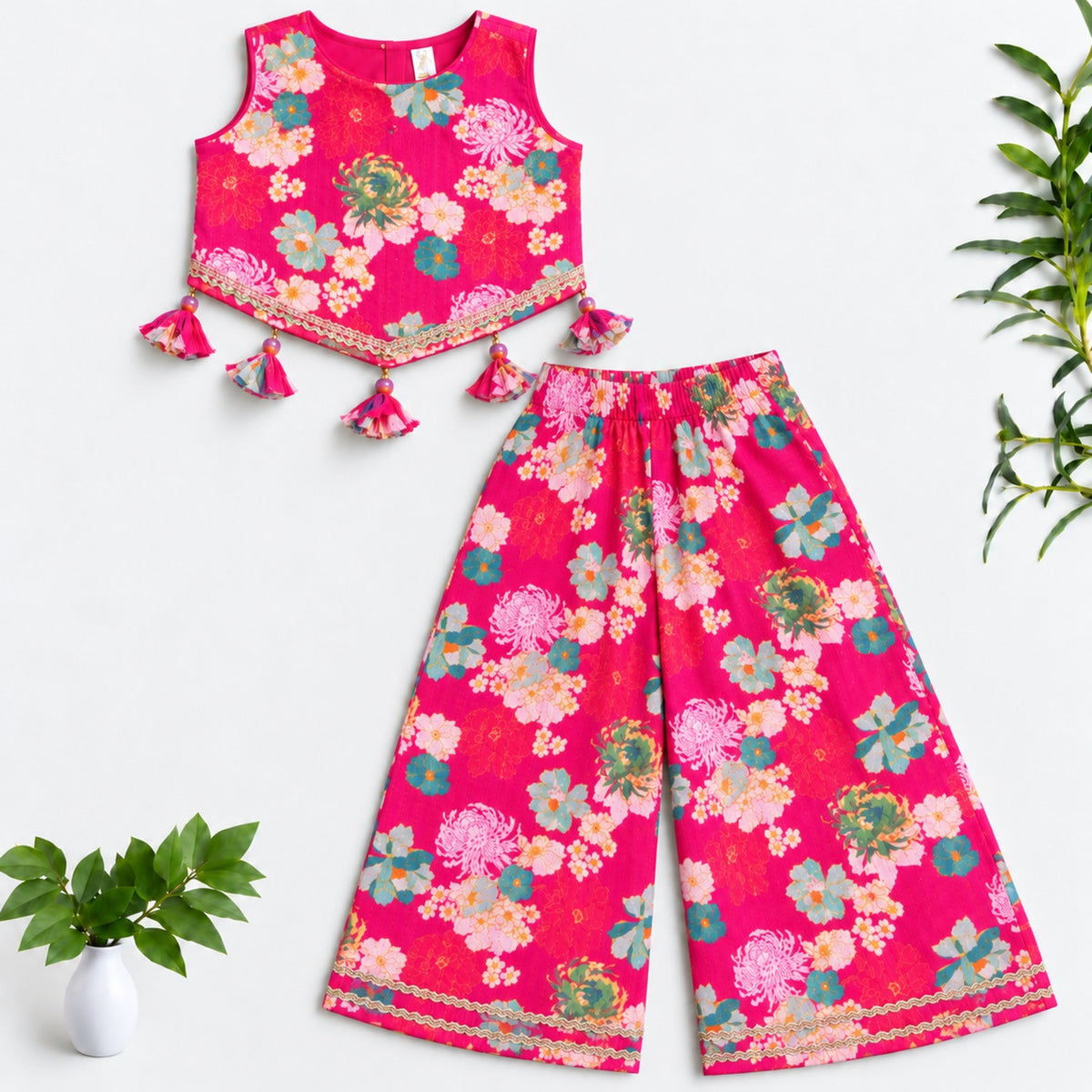 The Magic Wand Woven Sleeveless Floral Printed Tassel Detail Asymmetric Top And Top Set -  Fuchsia