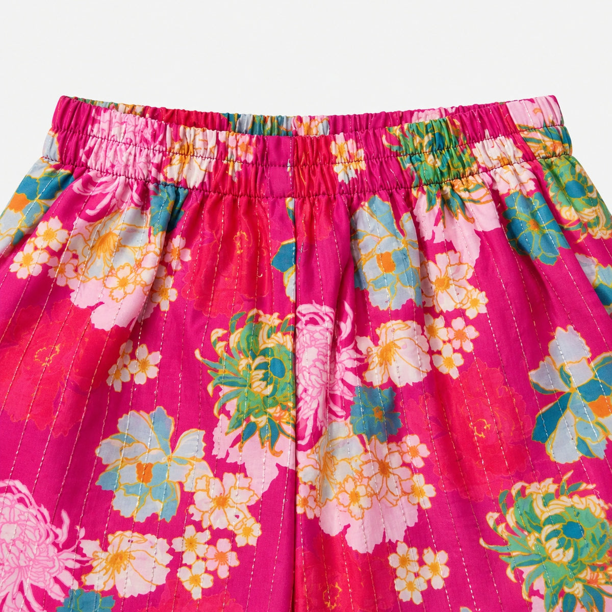 The Magic Wand Woven Sleeveless Floral Printed Tassel Detail Asymmetric Top And Top Set -  Fuchsia