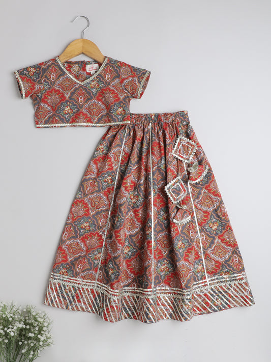Material- Cotton, Wash Care- Gentle Wash, Package Contain- Printed Lace Embellished Short Sleeves Blouse With Lehenga Set For Girls-Maroon