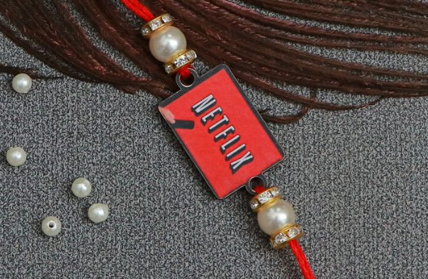 The Magic Wand Netflix Printed Wooden Rakhi - Red