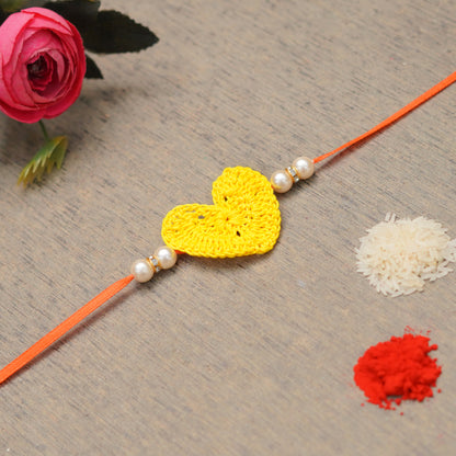 The Magic Wand Trendy Handcrafted Crochet Heart Shaped Rakhi - Yellow