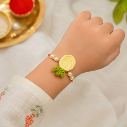 The Magic Wand Trendy Handcrafted Crochet Flower Shaped Rakhi - Yellow