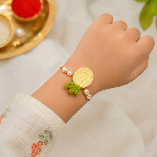 The Magic Wand Trendy Handcrafted Crochet Flower Shaped Rakhi - Yellow
