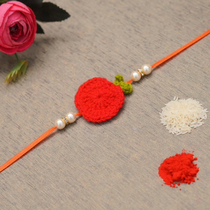 The Magic Wand Trendy Handcrafted Crochet Fruit Appliqué Shaped Rakhi - Red