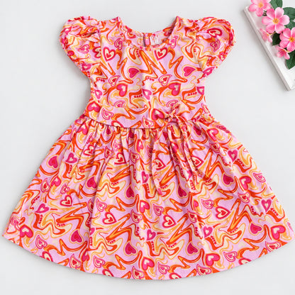 The Magic Wand Woven Puff Sleeves Abstract Heart Printed Flared Dress - Pink