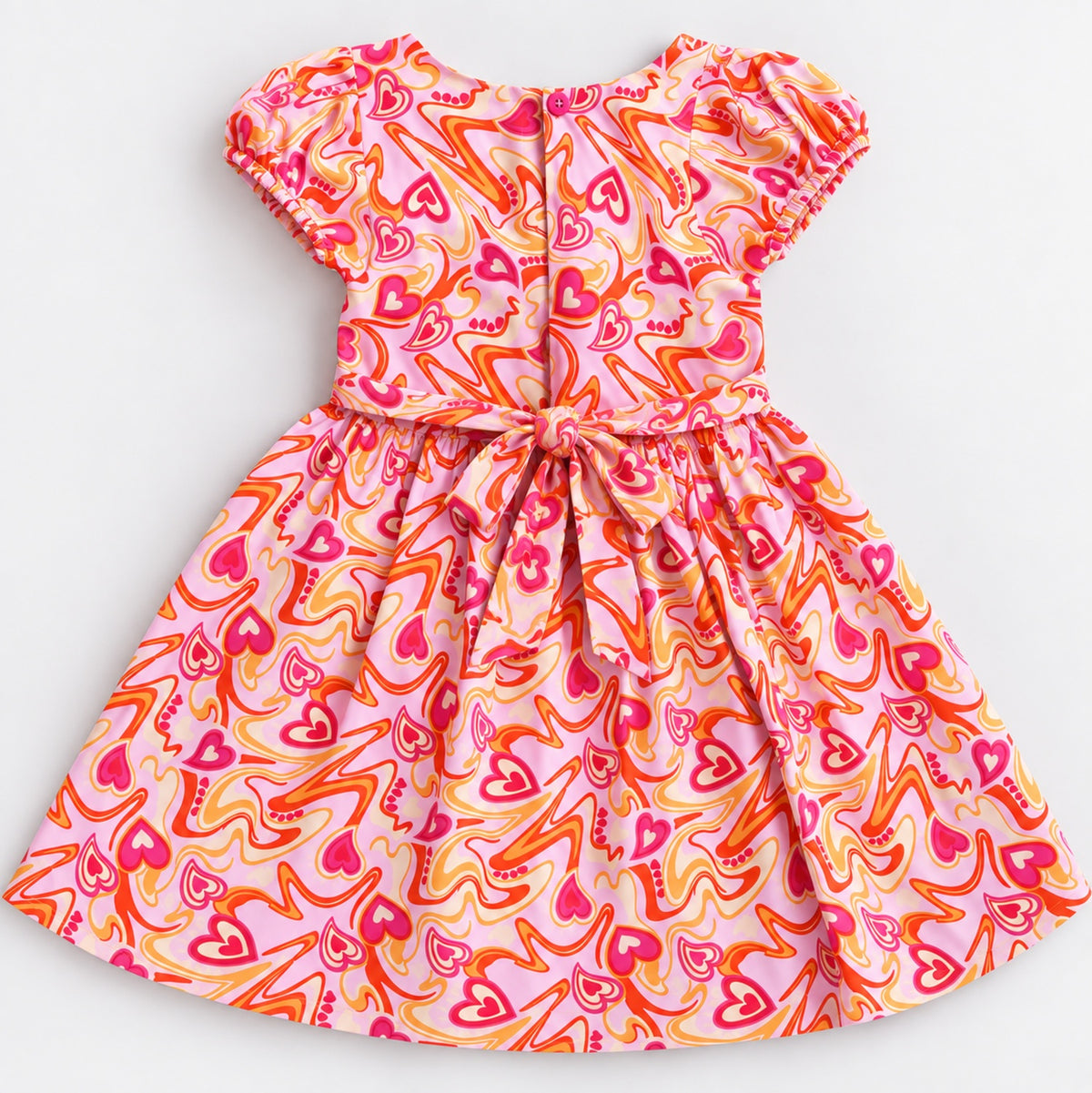 The Magic Wand Woven Puff Sleeves Abstract Heart Printed Flared Dress - Pink