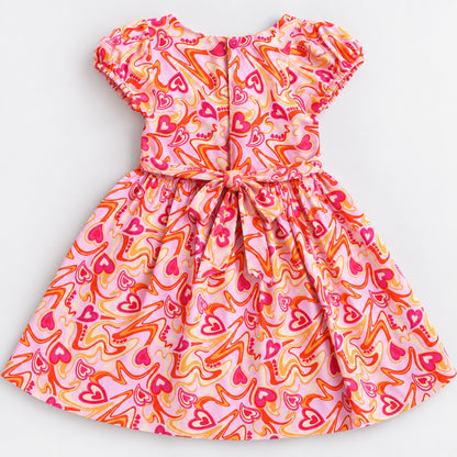 The Magic Wand Woven Puff Sleeves Abstract Heart Printed Flared Dress - Pink