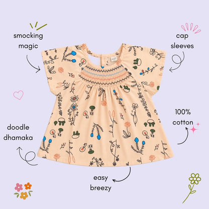 The Magic Wand Woven Cap Sleeves Botanical Printed Smocked Top- Peach