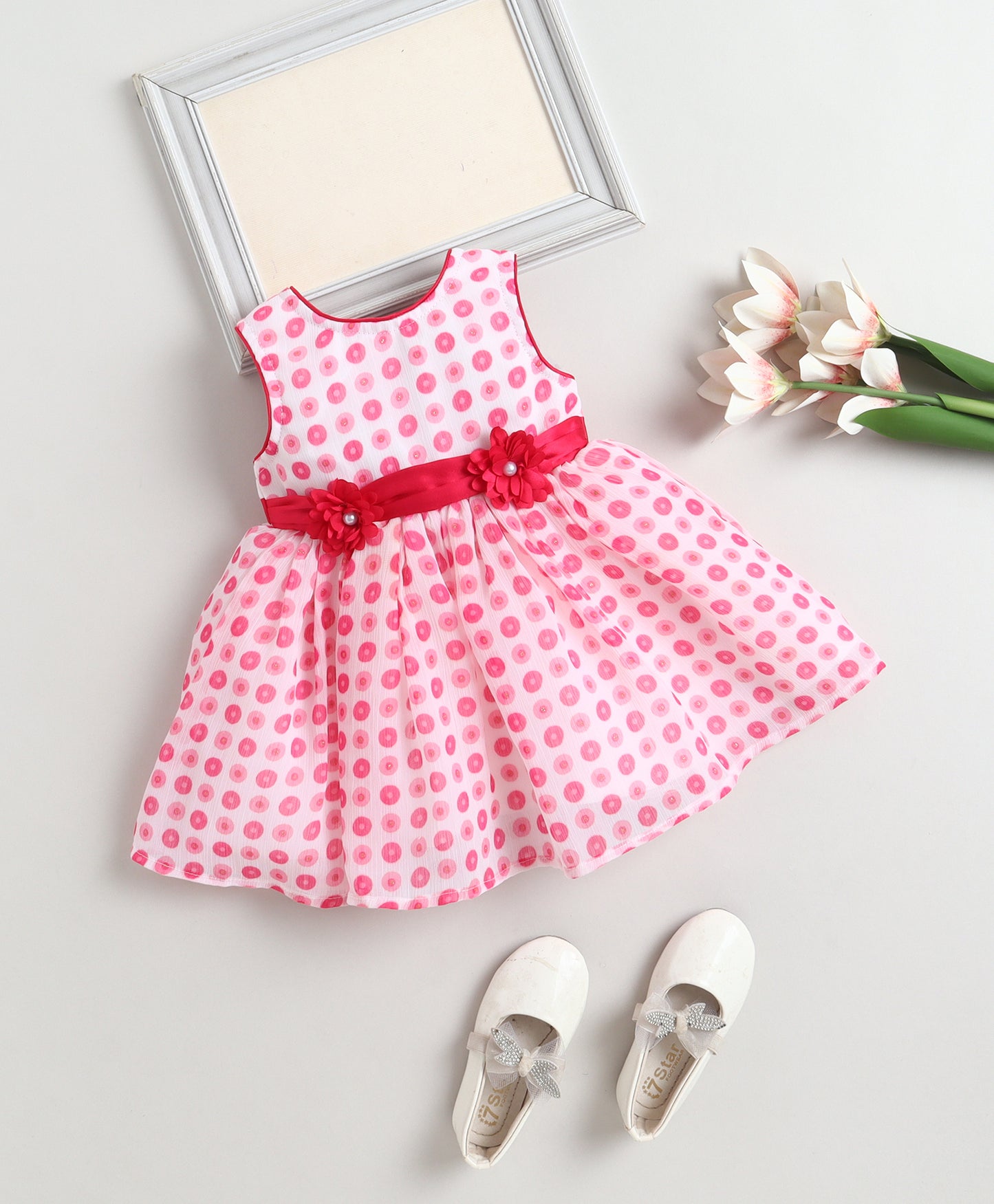 The Magic Wand Woven Sleeveless Polka Dots Printed Flared Dress With Floral Applique - Pink