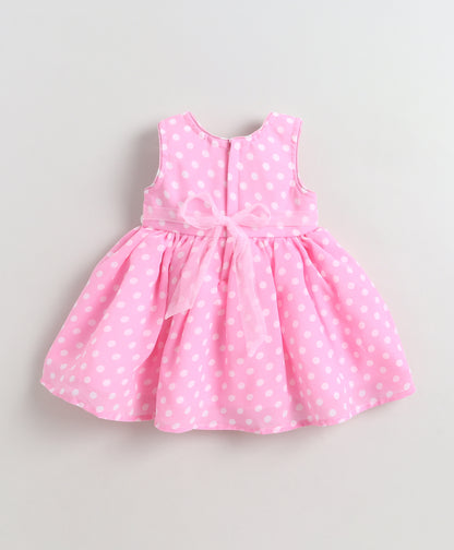 The Magic Wand Woven Sleeveless Polka Dot Pearl Embellished Flared Dress With Bow Applique - Pink