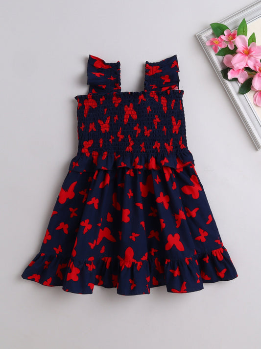The Magic Wand Sleeveless Smoke Detail Butterfly Printed Frill Dress -Navy Blue