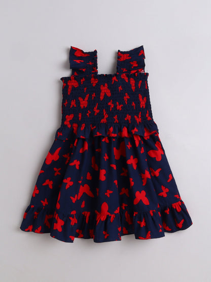The Magic Wand Sleeveless Smoke Detail Butterfly Printed Frill Dress -Navy Blue
